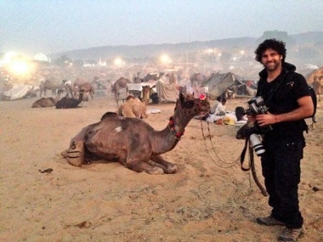 Valentino Lanus posing for a photo shoot in the desert.
